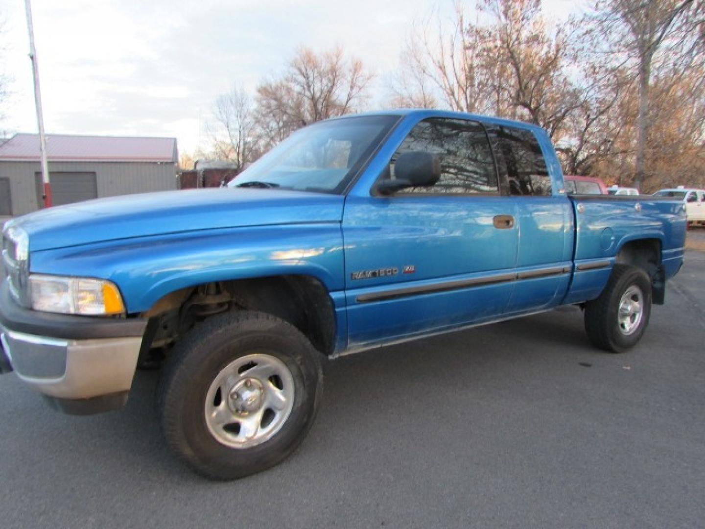 1999 Blue /Gray Dodge Ram 1500 SLT (3B7HF13Y9XG) with an 5.2 V8 Engine engine, 5 speed manual transmission, located at 4562 State Avenue, Billings, MT, 59101, (406) 896-9833, 45.769516, -108.526772 - Photo#0